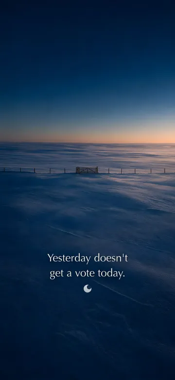 Morning affirmations wallpaper — dawn aerial photograph of a field of untouched overnight snow at dawn with one wooden gate in a fence line, with the affirmation 'Yesterday doesn't get a vote today.' in serif type.