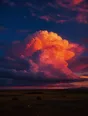 Film photograph: a towering thunderhead glowing magenta and gold at sunset over dark open plains.