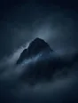 Dark elemental photograph: a solid dark peak in a sea of dusk fog, one fog current dissolving into faint teal marks as it streams past.