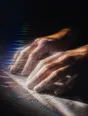 Prism-light photograph: Two hands dusted with flour resting on a floured work surface in hard sun.