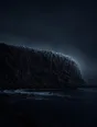 Dark elemental photograph: a cliff of hexagonal basalt columns at silver dusk, the newest columns at one end dissolving into glowing marks.