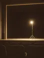 Struck-light photograph: a small theatre with the house dark and a single worklight standing on the empty stage