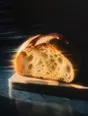 Prism-light photograph: A loaf cut open on a board with its crumb open all the way through, hard sun across the cut face.
