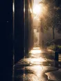 Motion photograph: hard sun breaking through the tail of a storm over a wet city, the rain still falling and lit