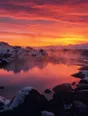 Film photograph: a natural hot spring steaming at dawn, rose and gold sky reflected in still water ringed with snow.