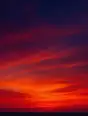 Grainy gradient illustration: An enormous layered sunset sky taking the whole frame, the sun already down, only a thin dark horizon line at the bottom.
