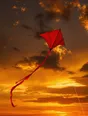 Film photograph: a bright red kite with a long tail blazing against a gold and amber sky, its line running out of frame.