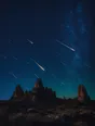 Film photograph: a meteor shower streaking bright trails across a dark desert sky above rock formations.