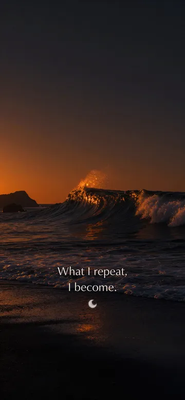 Self-talk affirmations wallpaper: dark elemental photograph of ember waves breaking on black sand at dusk, the next swell crest dissolving into small glowing marks, with the affirmation 'What I repeat, I become.' in serif type.